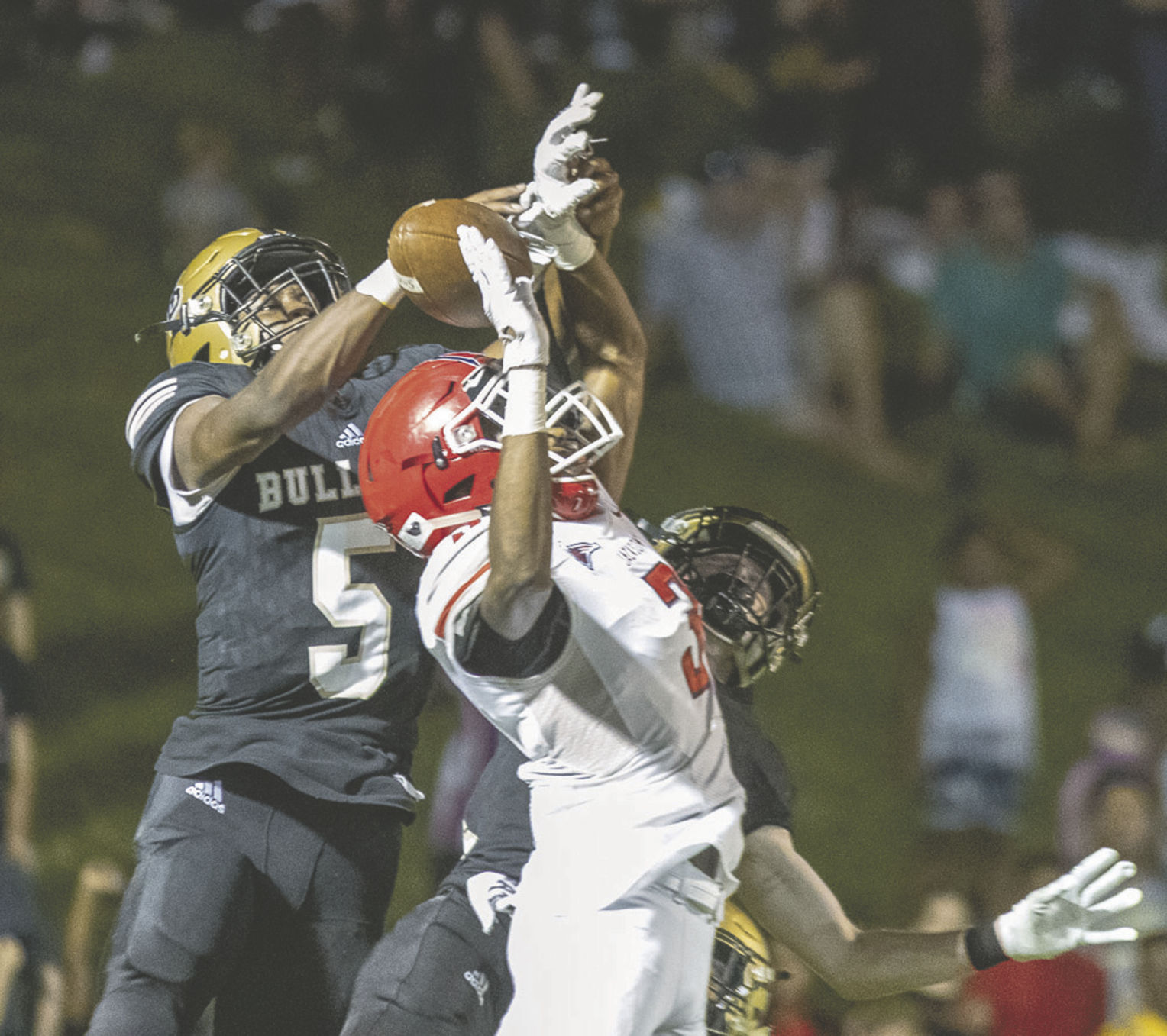 Malikk Harris (5) breaks up a Jackson Hail Mary to secure the 36-29 win for the Dogs on Friday. (Photo/Kim Holderfield)